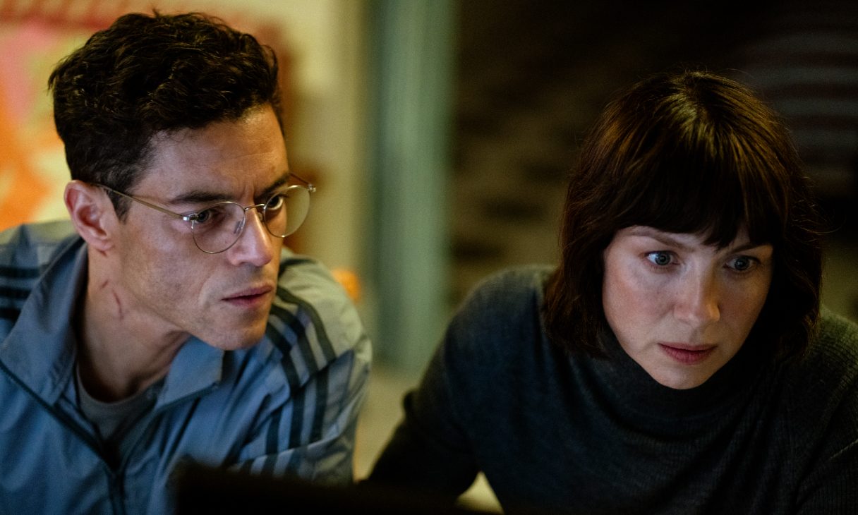 (L-R) Rami Malek as Heller and Caitriona Balfe as Inquiline in 20th Century Studios' THE AMATEUR
